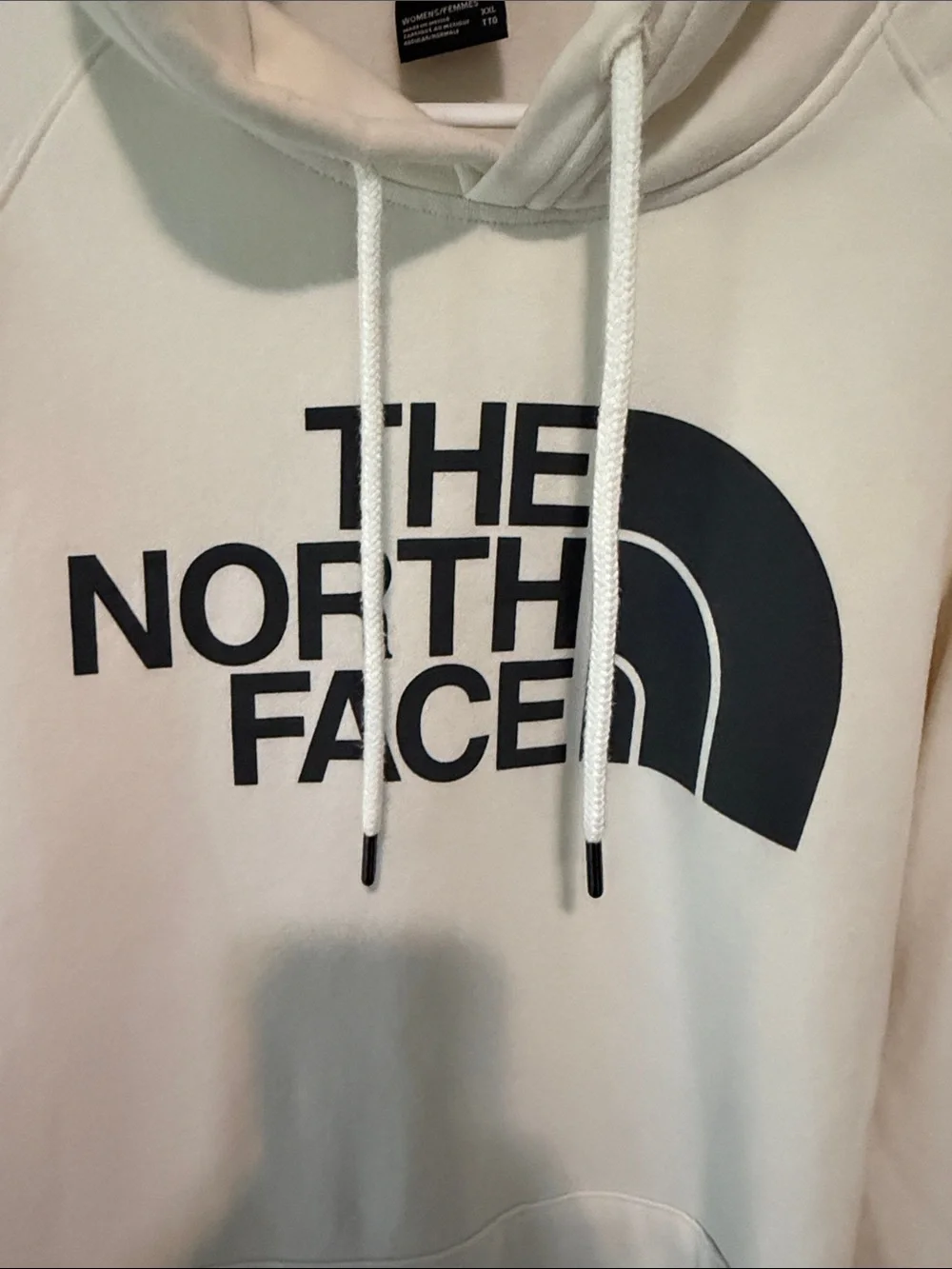 The North Face Cream Hoodie with Black Logo